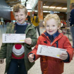 Cian O'Sullivan (5) and his brother Alex (3), from Kildysart, Co Clare, at the 2016 Santa Flights special at Shannon