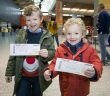 Cian O'Sullivan (5) and his brother Alex (3), from Kildysart, Co Clare, at the 2016 Santa Flights special at Shannon