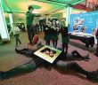 Students Barra O'Siochru, Katie Tobin and Laura Hynes from the Gael Cholaiste in Tralee and classmates take part in the mannequin challenge with 250 other students in the INEC Killarney. Photo: Domnick Walsh © Eye Focus Ltd