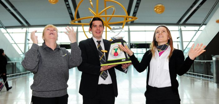 Andreea Mantea, Daniel Jordan and Denise O'Hanlon. daa staff celebrating €2m raised for 18 Irish charities over 10 years.