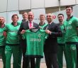 Warren Deutrom, CEO of Cricket Ireland, and Hasan Mutlu, Turkish Airlines, with members of the Irish cricket team