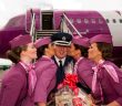 Ken Roberts, Chief of Airport Police, gets a welcome kiss from cabin crew members Andrea Lisa Kjartansdottir, Andrea Osk Porkelsdottir, Soldis Bjorg Oskardottir and Nanna Margaret Kristinsdottir from the inaugural WOW flight to Cork