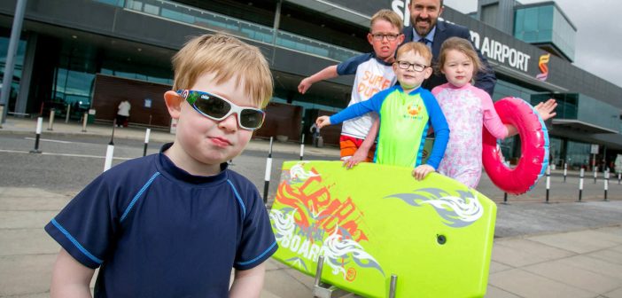 Charlie (8), Neela (5), Alfie (4) and George Harrison (3), from Annacotty, Co Limerick, with Andrew Murphy, Managing Director Shannon Airport. Photo: Arthur Ellis