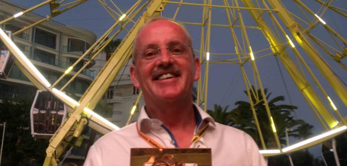 Brian Twomey, Tourism Ireland’s Head of Marketing Communications, with the Gold Lion award for ‘Outdoor – Special Build’ for Tourism Ireland’s ‘Doors of Thrones’ campaign