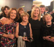 Stephanie Frame and Mary McKenna celebrate Mary's Entrepreneur award with Evelyn and Mary McKenna, sisters of the Tour America MD's late father. Back row, Mary's sister Geraldine Saunders, who is Tour America's HR manage,r and Sue Quinn, a former Tour America GM who has set up her own business, plus brother in law Patrick Quinn, formerly Mary's Financial Controller.