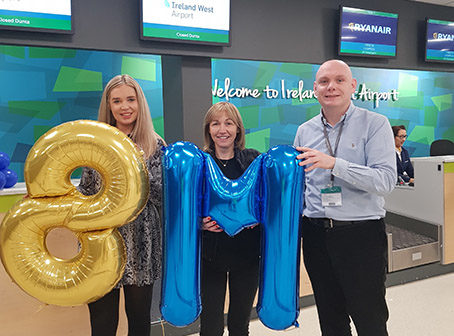 Eimear Ryan, Ryanair Sales and Marketing executive for Britain and Ireland; eight millionth passenger Irene Davey from, Ballaghaderreen, Co Roscommon, and Donal Healy, Knock Airport Head of Marketing and Route Development.