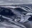 Cars damaged by missing wheel of Boeing 777-222ER) aircraft at San Francisco.