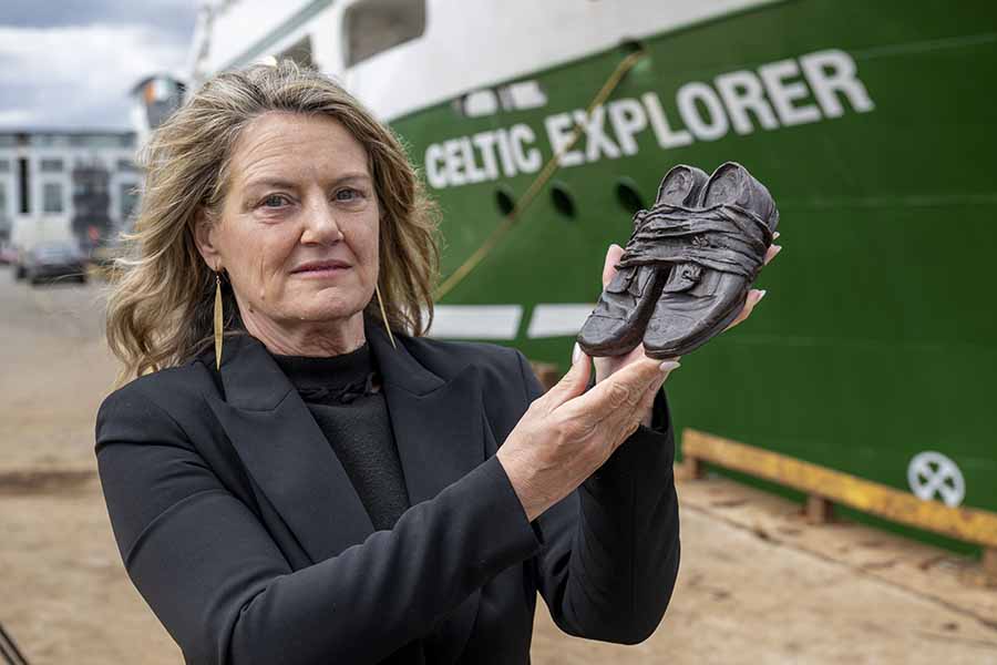 Caroilin Callery Irish Famine Way who presented Captain Denis Rowan, RV Celtic Explorer, with replica Bronze Shoes that are to be transported and presented in Canada