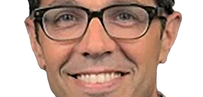 Adam Sacks president of Tourism Economics