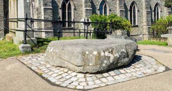 Saint Patrick's grave in Downpatrick, where local landowner Hugh de Lacy miraculously discovered the body and ham him reinterred alongside saints Brigid and Colmcille in 1185, shortly after he had seized the kingdom from the Irish