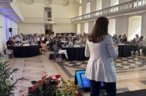 Daniella Cintra speaking at the ITAA conference in Alcobaca