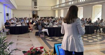 Daniella Cintra speaking at the ITAA conference in Alcobaca