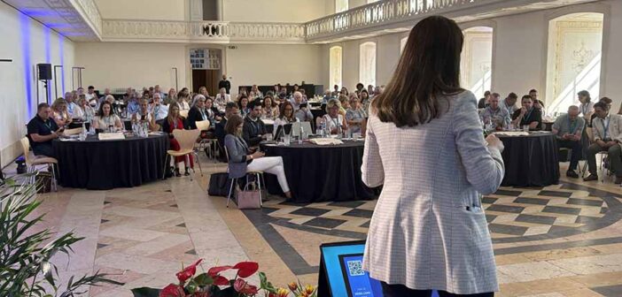 Daniella Cintra speaking at the ITAA conference in Alcobaca