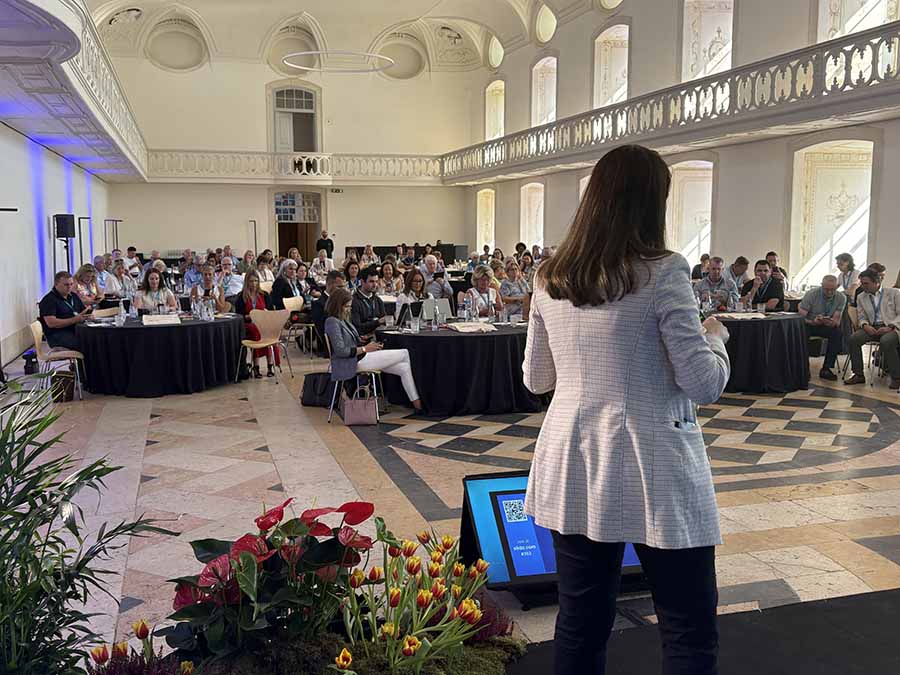 Daniella Cintra speaking at the ITAA conference in Alcobaca