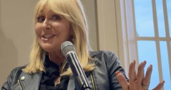 Miriam O'Calaghan speaking at the 30th anniversary even for Travel Department