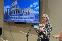 Clare Doherty speaking at the 30th anniversary even for Travel Department