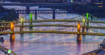 Three Sisters Bridges in green, white and orange to celebrate the launch of the direct Aer Lingus Dublin to Pittsburgh route in May 2026