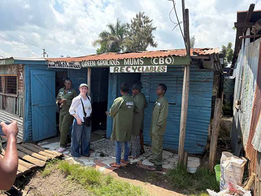 International Marketing Executive at Riviera Travel, Ella-Renai Locke, outside Gracious Mums’ Recycling Centre in Kisumu, Kenya.
