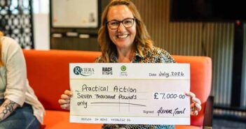 Office Manager and Head of Charity at Riviera Travel, Jane Walker, presenting Practical Action with a cheque for £7,000